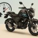 Yamaha FZ motorcycle on road highlighting factors affecting its fuel efficiency and mileage